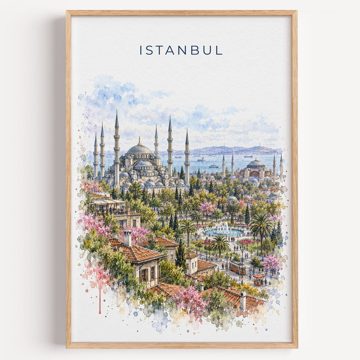 Istanbul watercolor print in a light oak frame on a plain white wall
