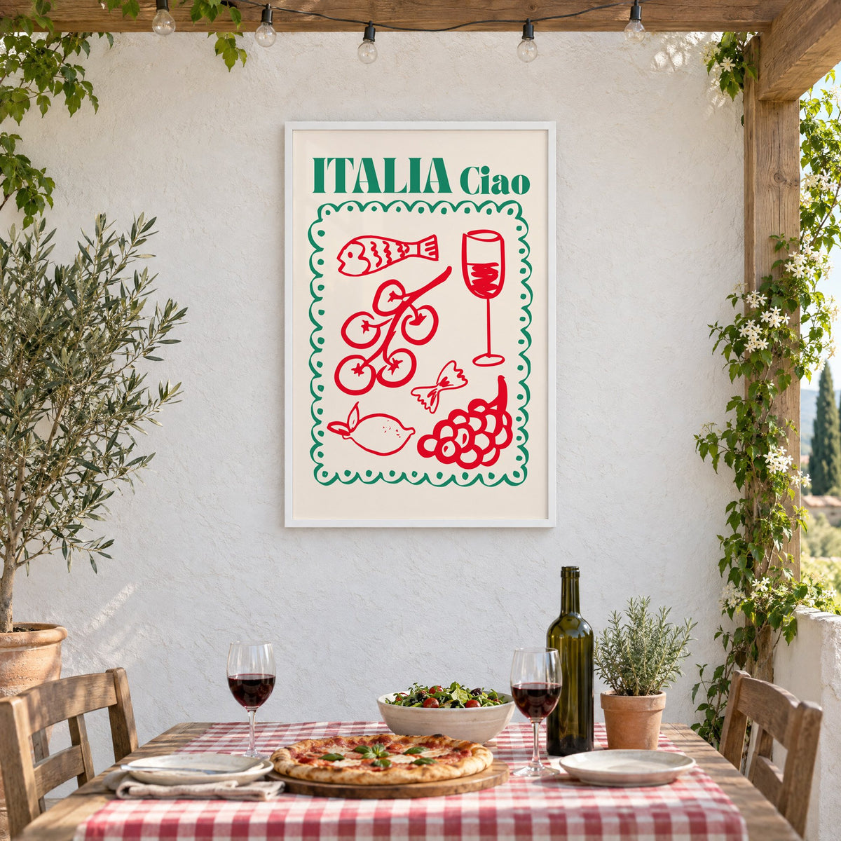 ITALIA Ciao red food doodles print in a white frame on a stucco wall above a checked-cloth table with pizza and red wine