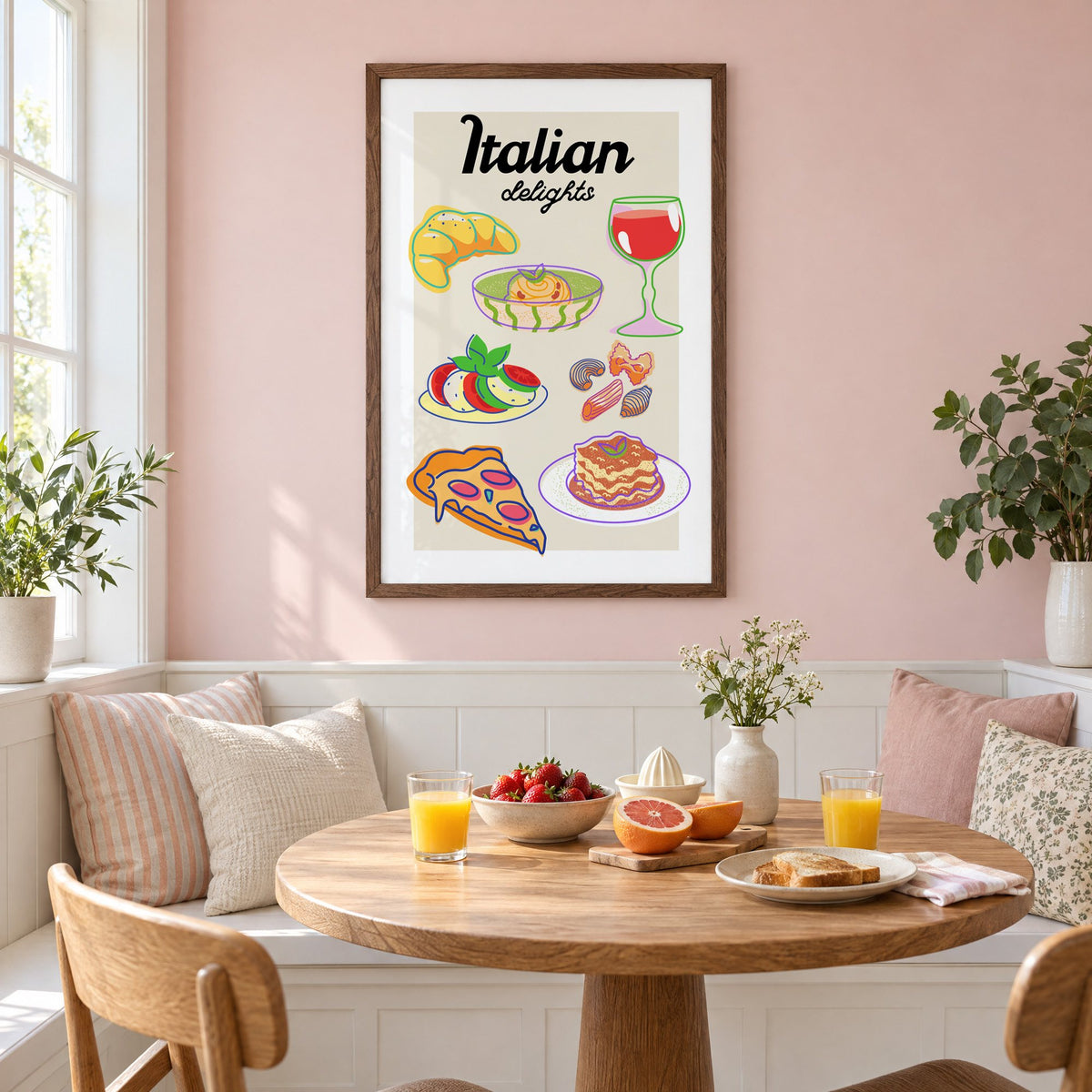 Italian delights colorful food doodle print in a walnut frame on a pastel pink wall above a breakfast nook with strawberries and orange juice