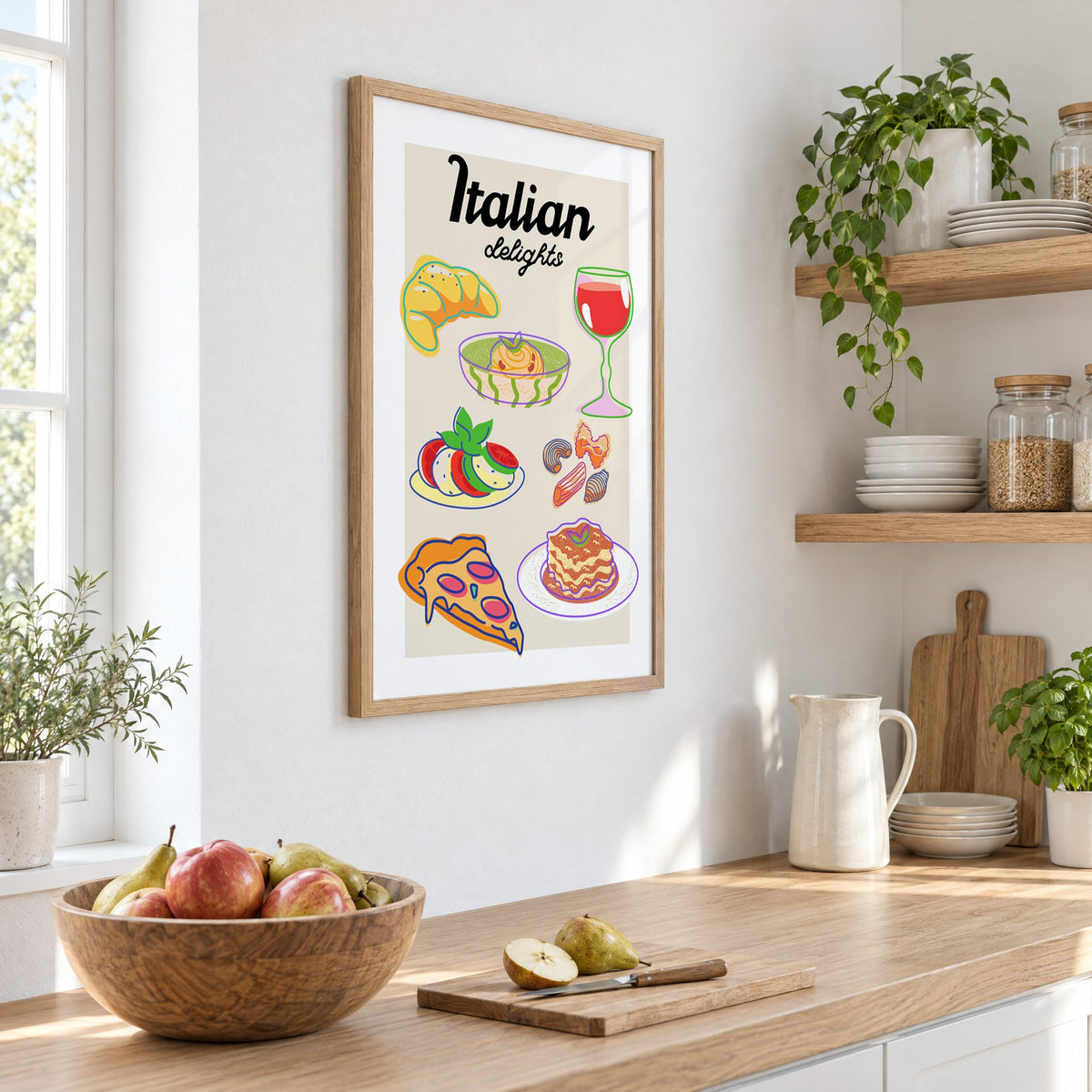 Italian delights colorful food doodle print in an oak frame on a white kitchen wall above a counter with apples and pears, seen at an angle