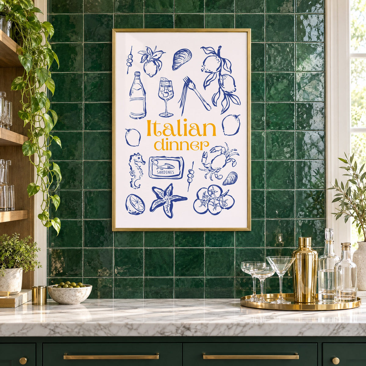 Italian dinner blue doodle print in a brass frame on emerald green tiles above a home bar with coupe glasses