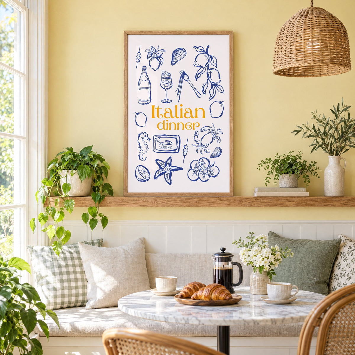 Italian dinner blue doodle print in an oak frame on a picture ledge above a sunny breakfast nook