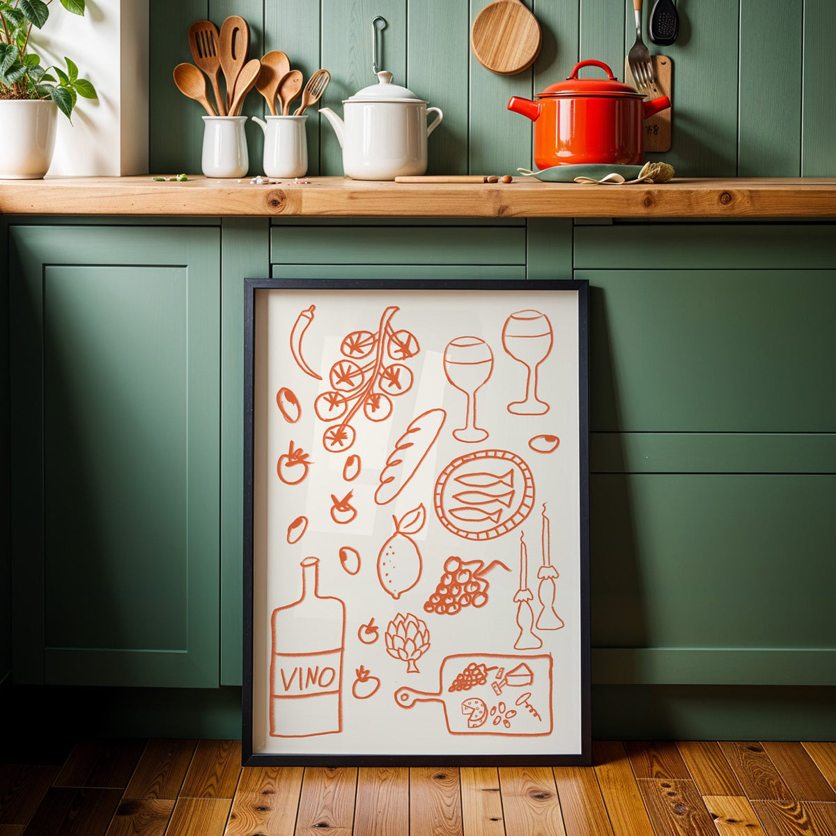 Italian pantry doodle print in a black frame against sage green kitchen cabinets