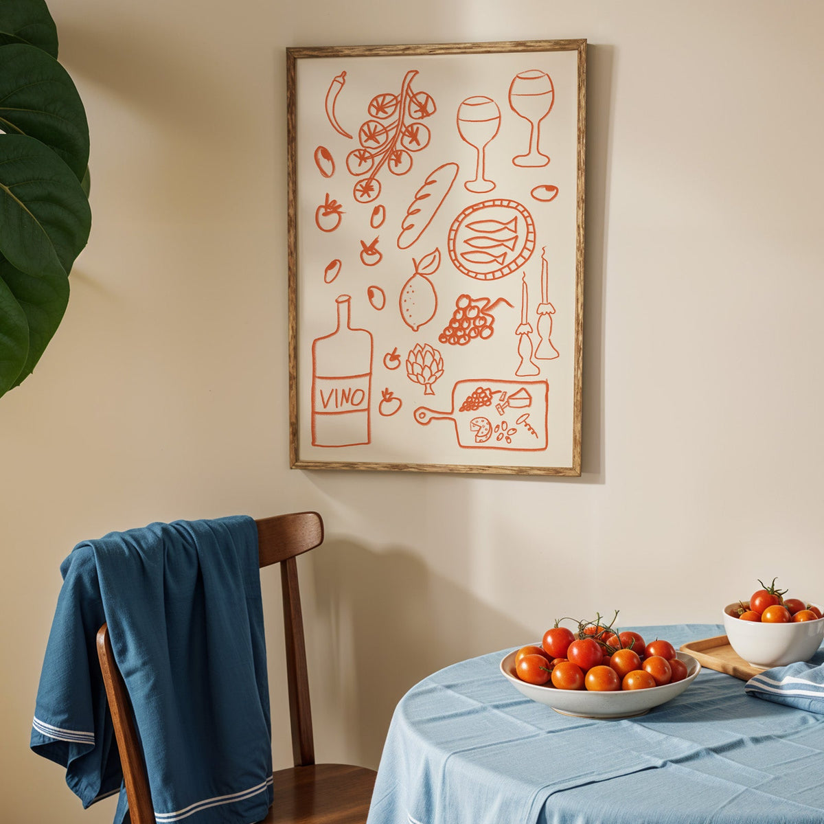 Italian pantry doodle print in an oak frame above a blue linen table with ripe tomatoes