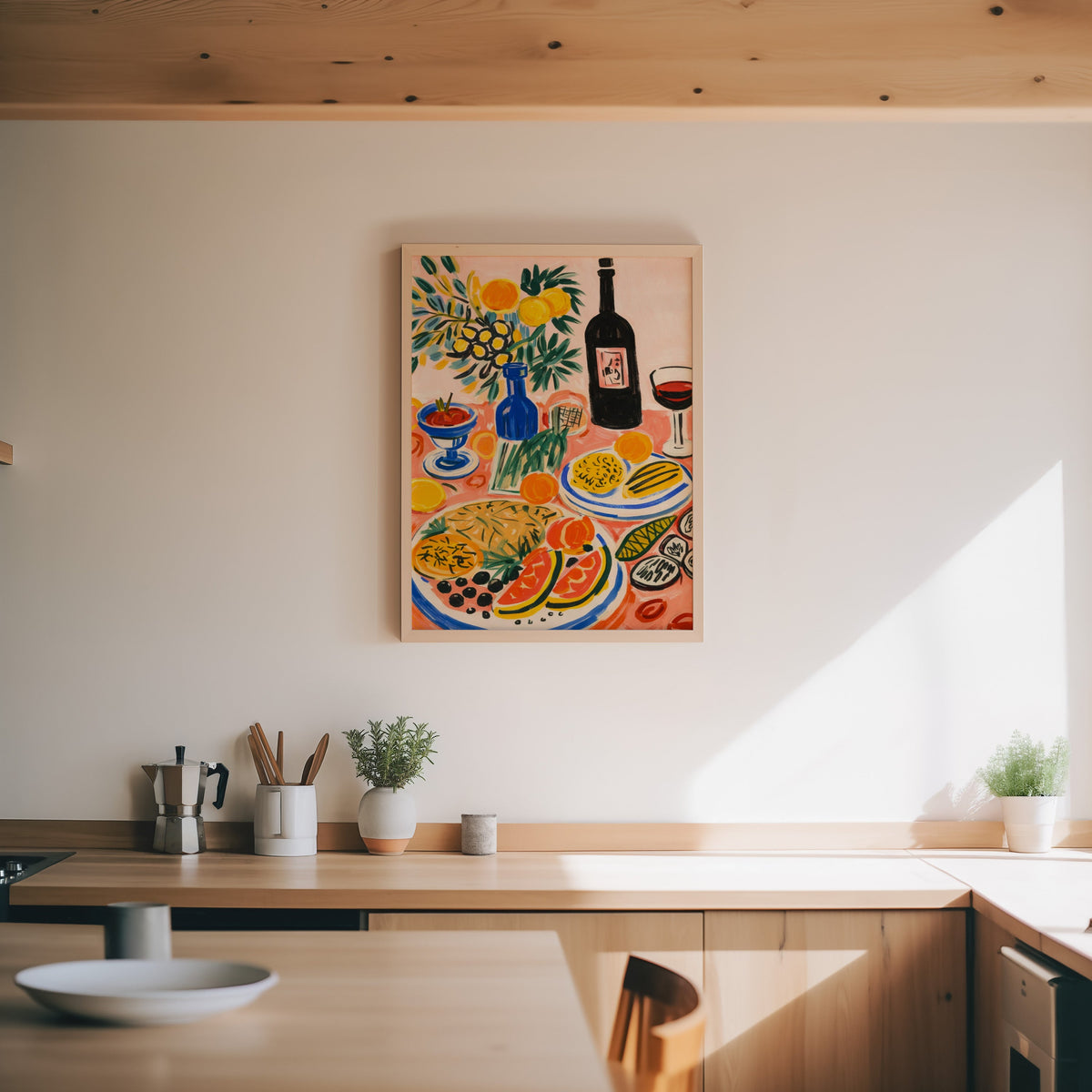 Italian table print in an oak frame above a wood counter with a moka pot and herbs