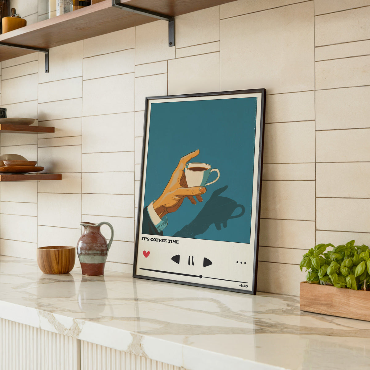 It's Coffee Time print in a black frame leaning on a marble counter in a tiled kitchen