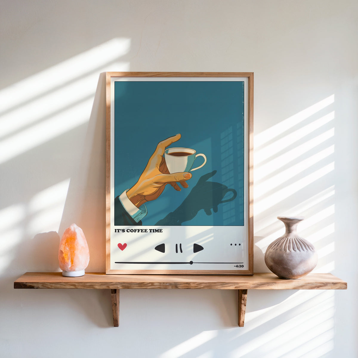 It's Coffee Time print in an oak frame on a live-edge shelf beside a salt lamp
