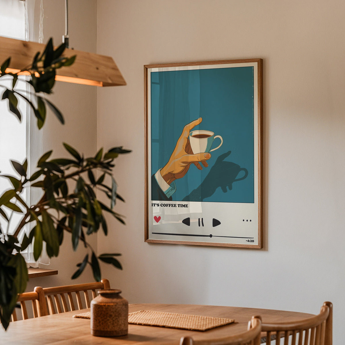 It's Coffee Time print in a walnut frame above a dining table with olive branches
