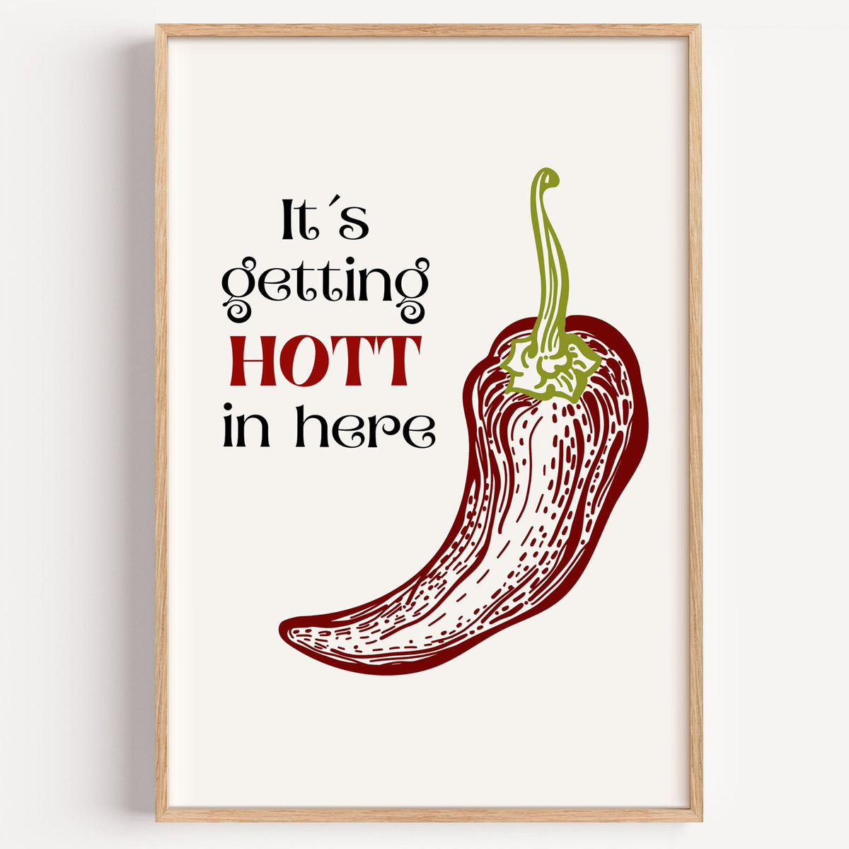 It's getting HOTT red chili print in a light oak frame on a plain white wall