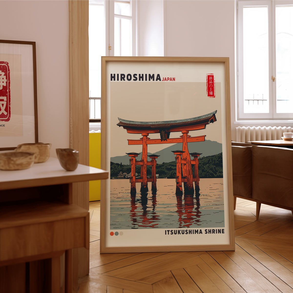 Retro Itsukushima torii gate print in an oak frame on the parquet floor of a sunlit living room