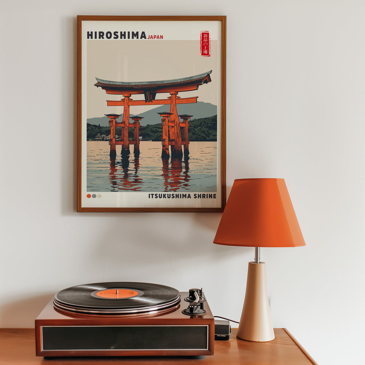 Retro Itsukushima torii gate print in a walnut frame above a sideboard with a record player