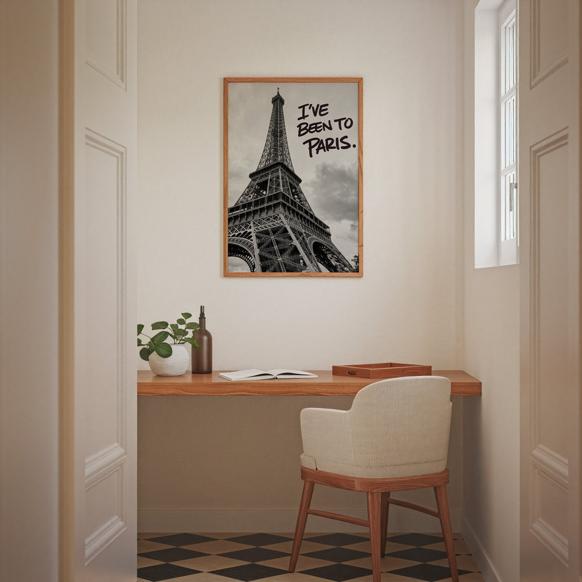I've Been to Paris handwritten quote on Eiffel photo print in an oak frame above a home office desk nook