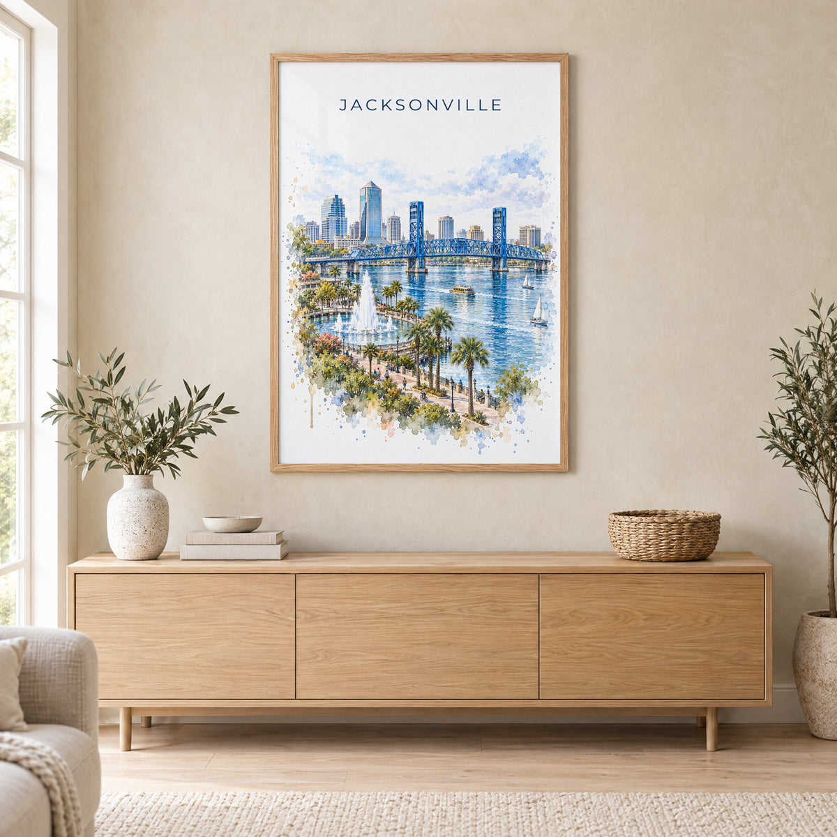 Jacksonville, Florida watercolor print in an oak frame above a light wood sideboard in a Scandinavian living room