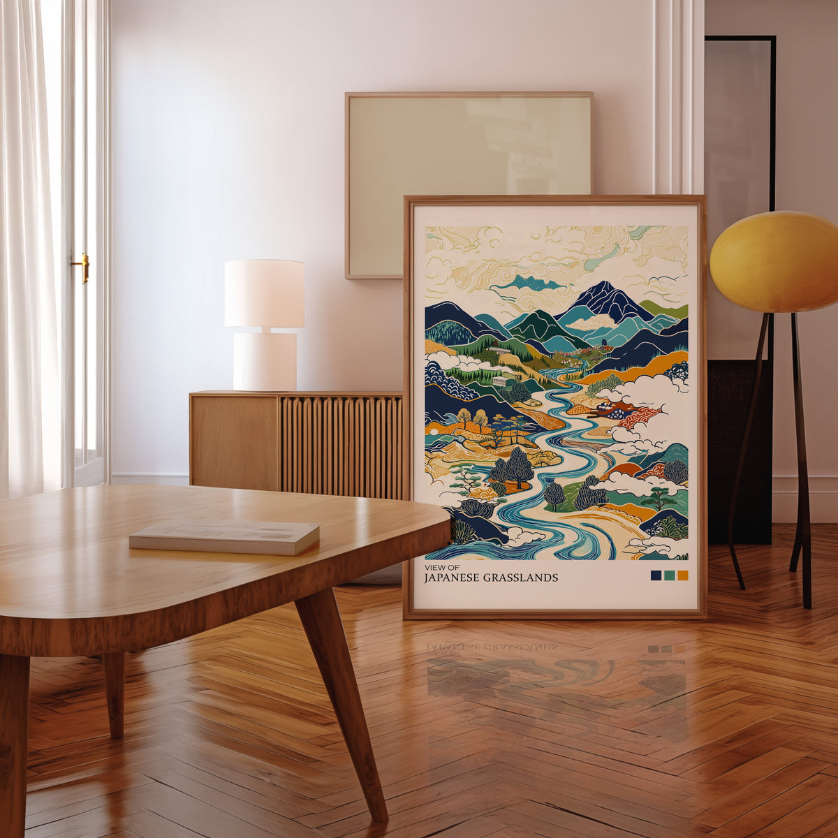 View of Japanese Grasslands river valley print in a walnut frame leaning in a mid-century living room