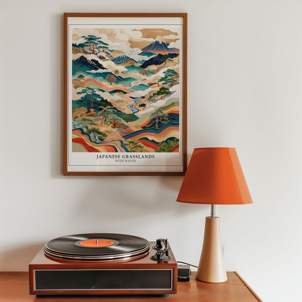 Japanese Grasslands with Waves Fuji print in a walnut frame above a sideboard with a record player