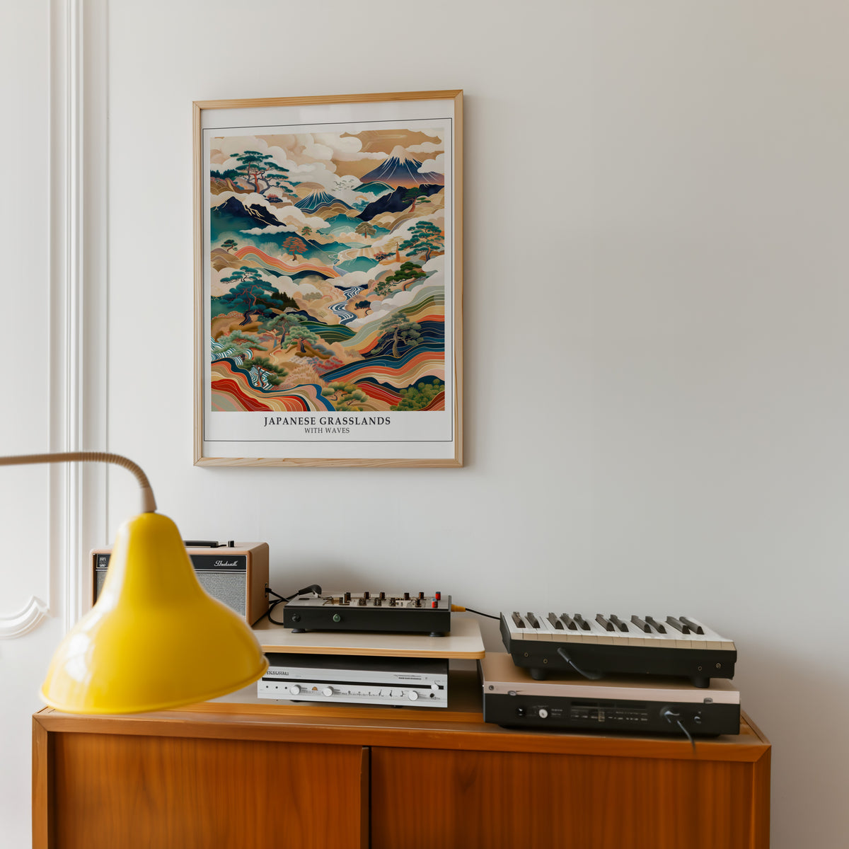Japanese Grasslands with Waves Fuji print in an oak frame above a teak sideboard with vintage hi-fi