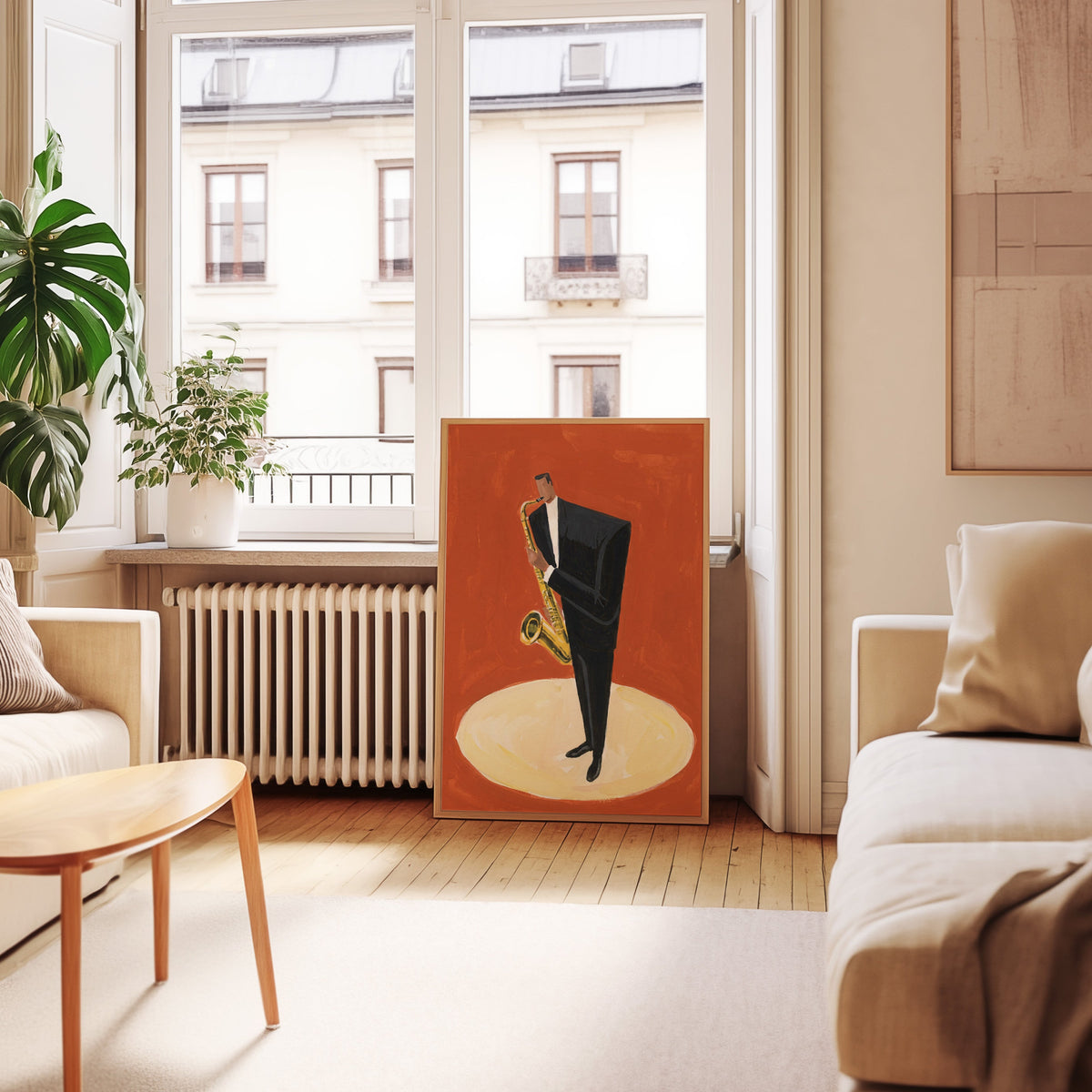 Saxophonist in spotlight print in an oak frame leaning below tall French windows