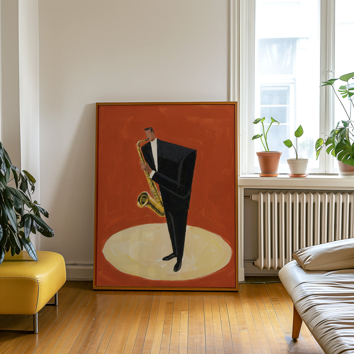 Music wall art print in an oak frame leaning beside a yellow leather bench