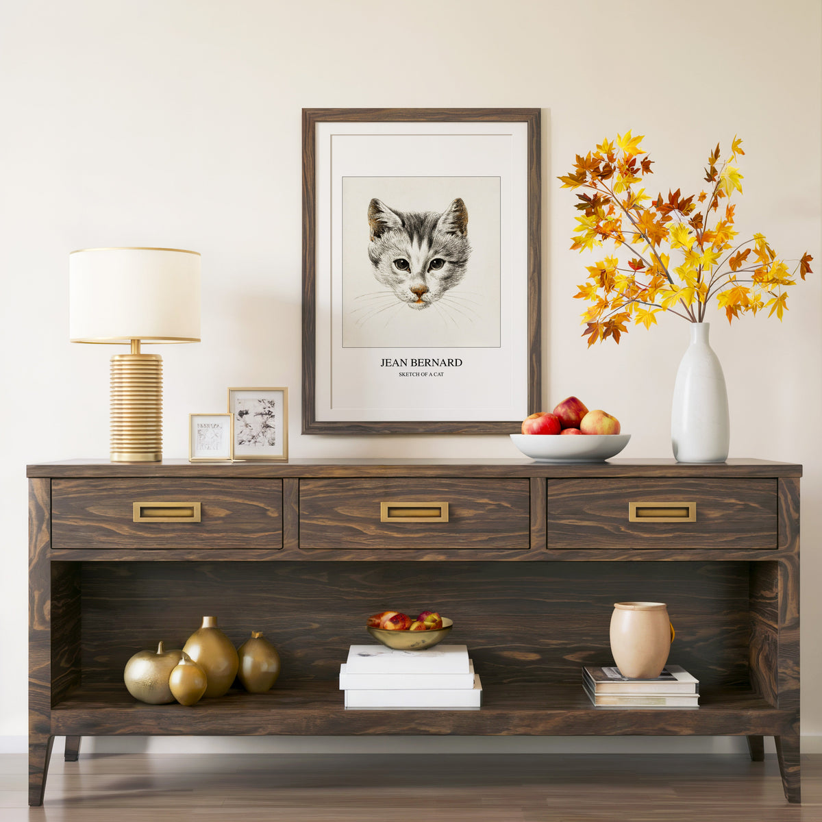 Sketch of a Cat print in a walnut frame above a console with autumn branches