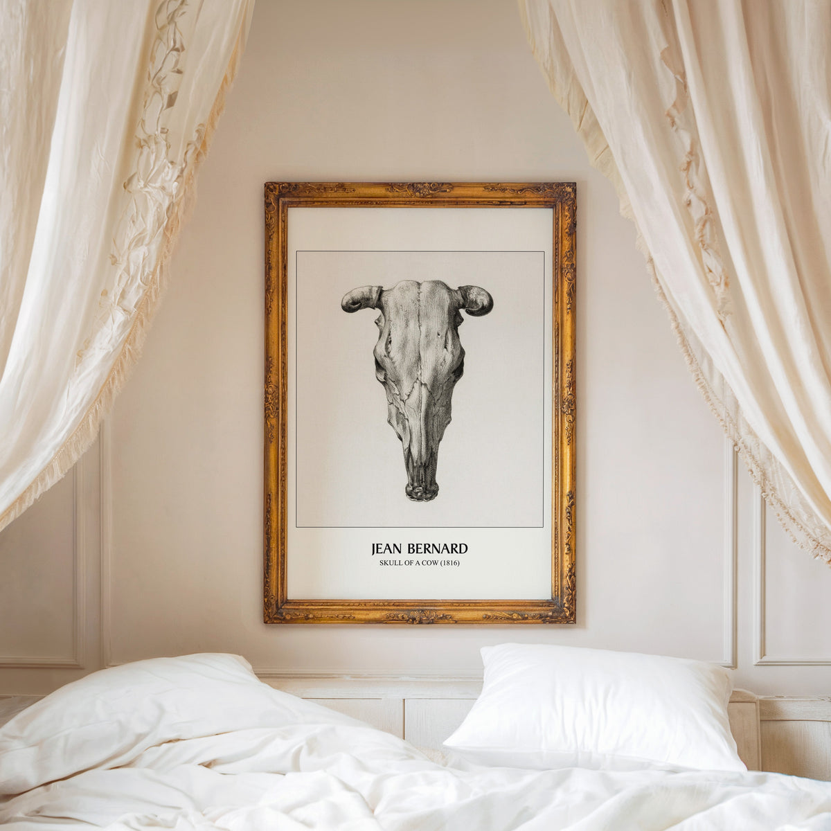 Skull of a Cow print shown in an ornate gold frame above a canopy bed