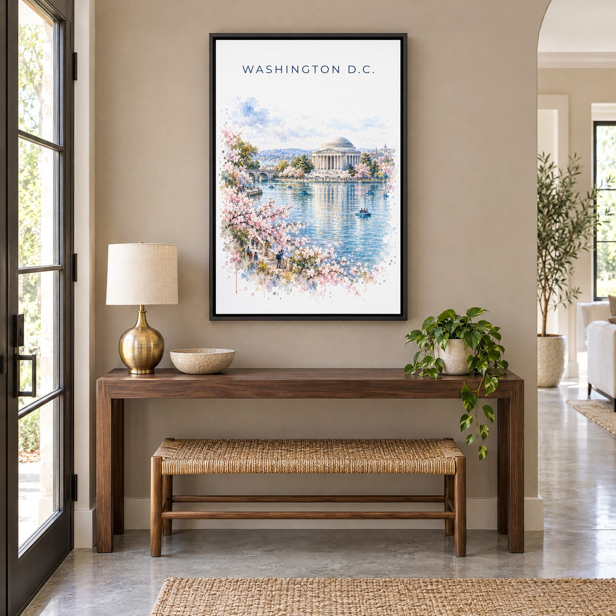 Jefferson Memorial watercolor print as a black floater canvas above a walnut console and woven bench in an entryway