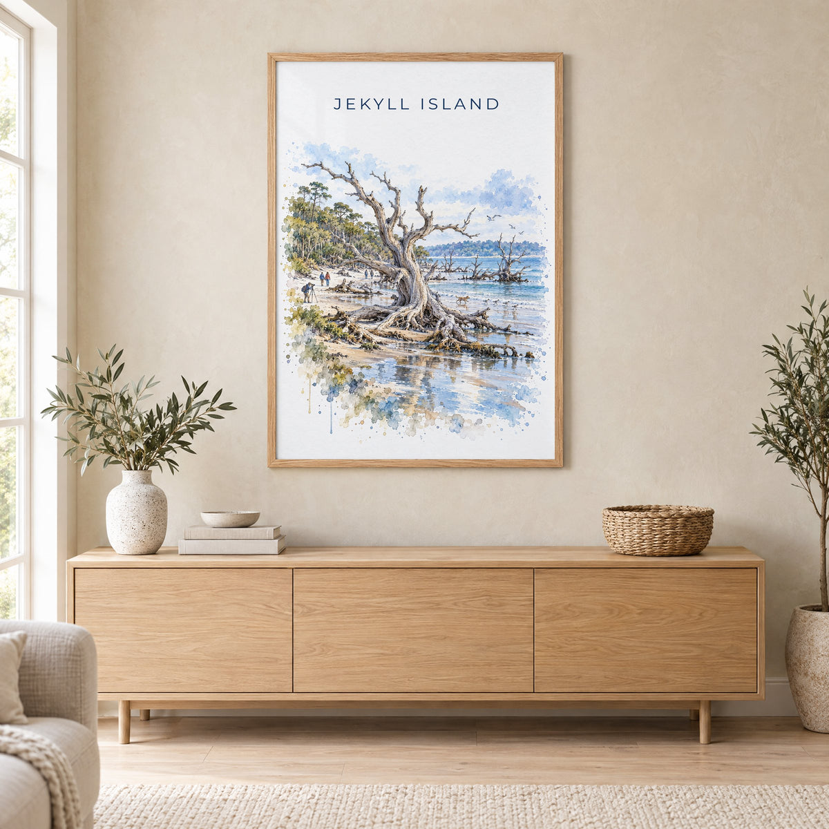 Jekyll Island watercolor print in an oak frame above a light wood sideboard in a Scandinavian living room