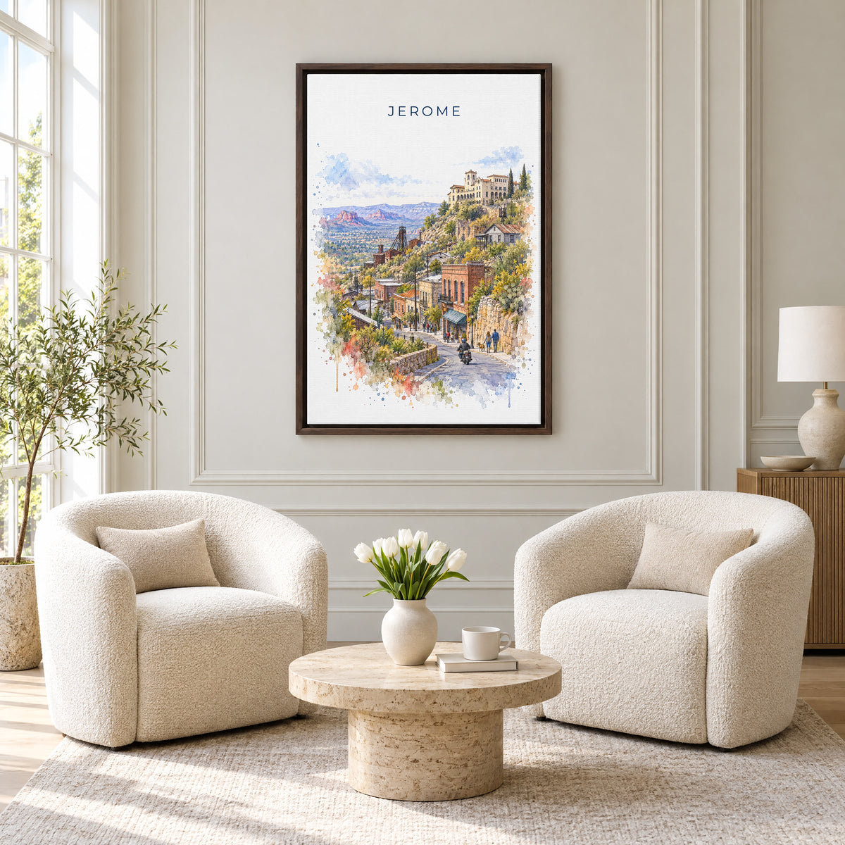 Jerome, Arizona watercolor print as an espresso floater canvas above two boucle armchairs in a hotel lounge