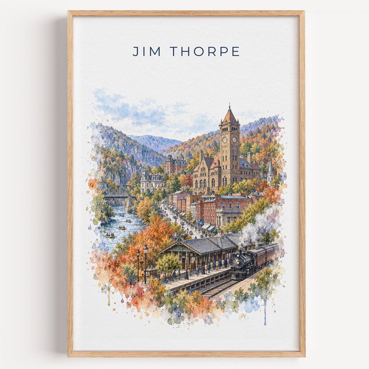 Jim Thorpe, Pennsylvania watercolor print in a light oak frame on a plain white wall