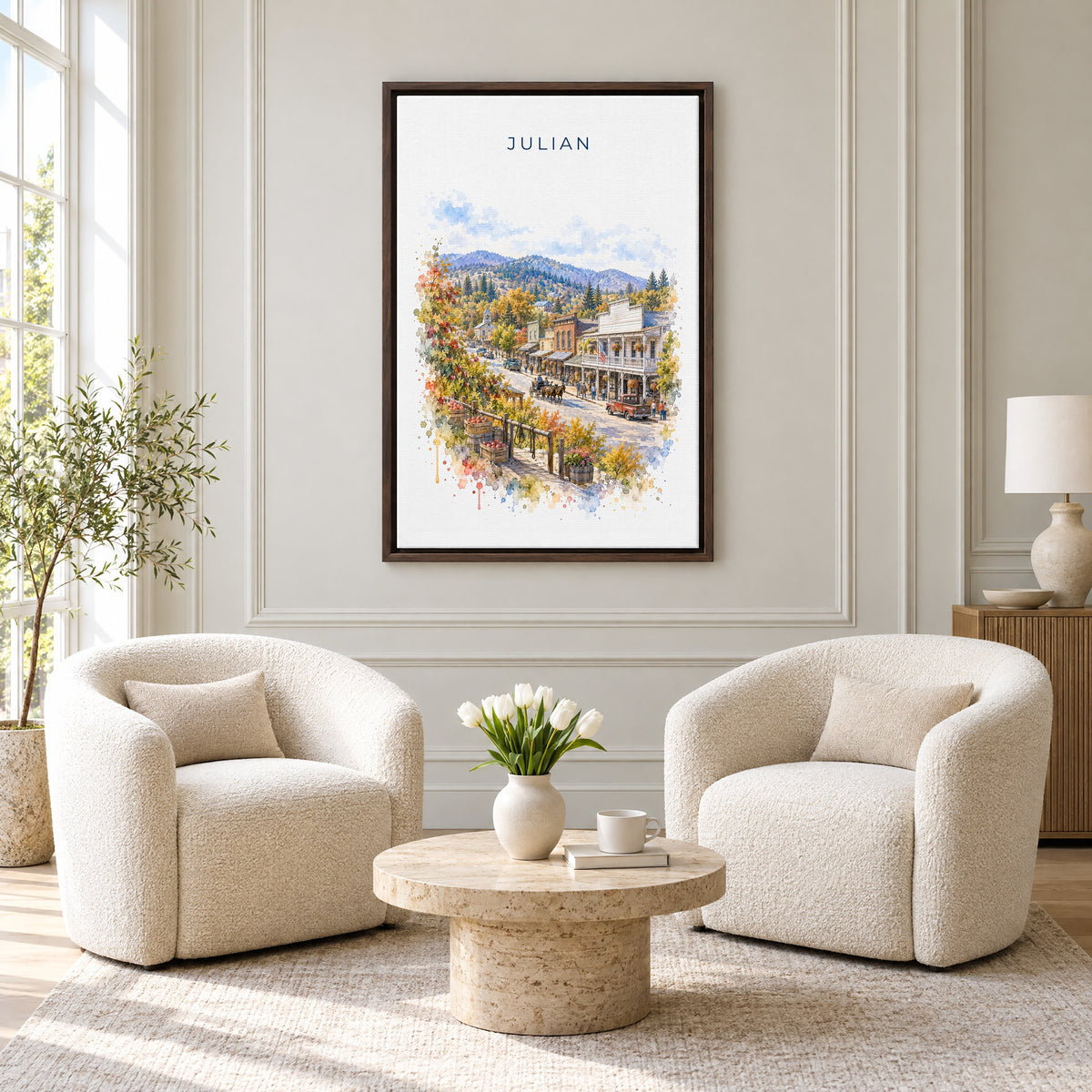 Julian, California watercolor print as an espresso floater canvas above two boucle armchairs in a hotel lounge