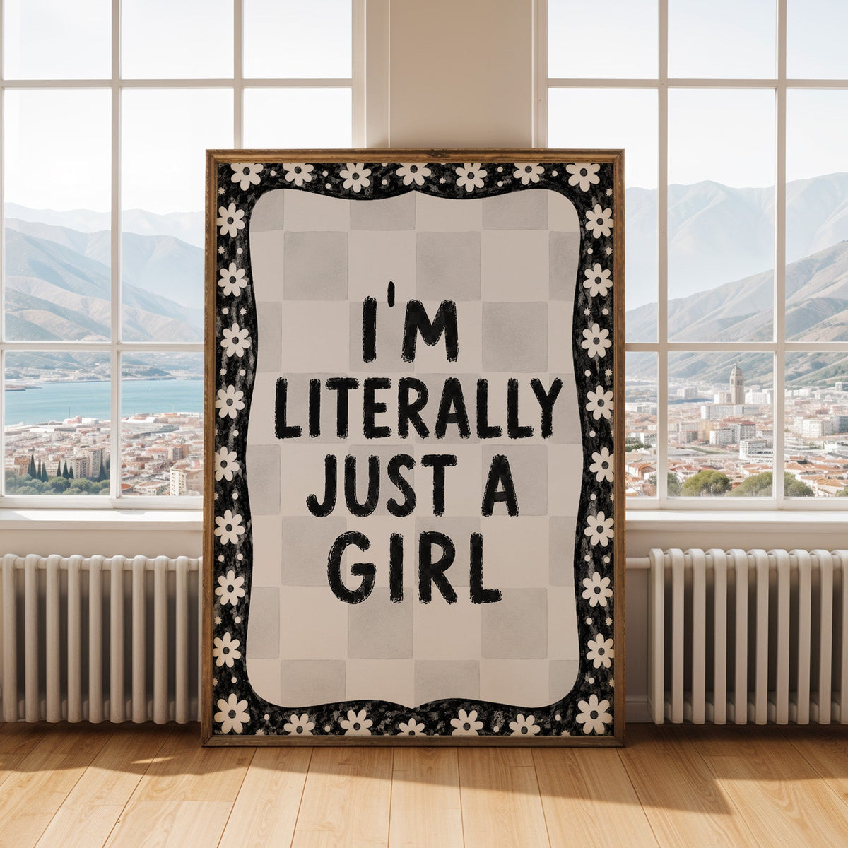 I'm literally just a girl quote with daisy border print shown in an antique gold frame by tall windows with a sea view