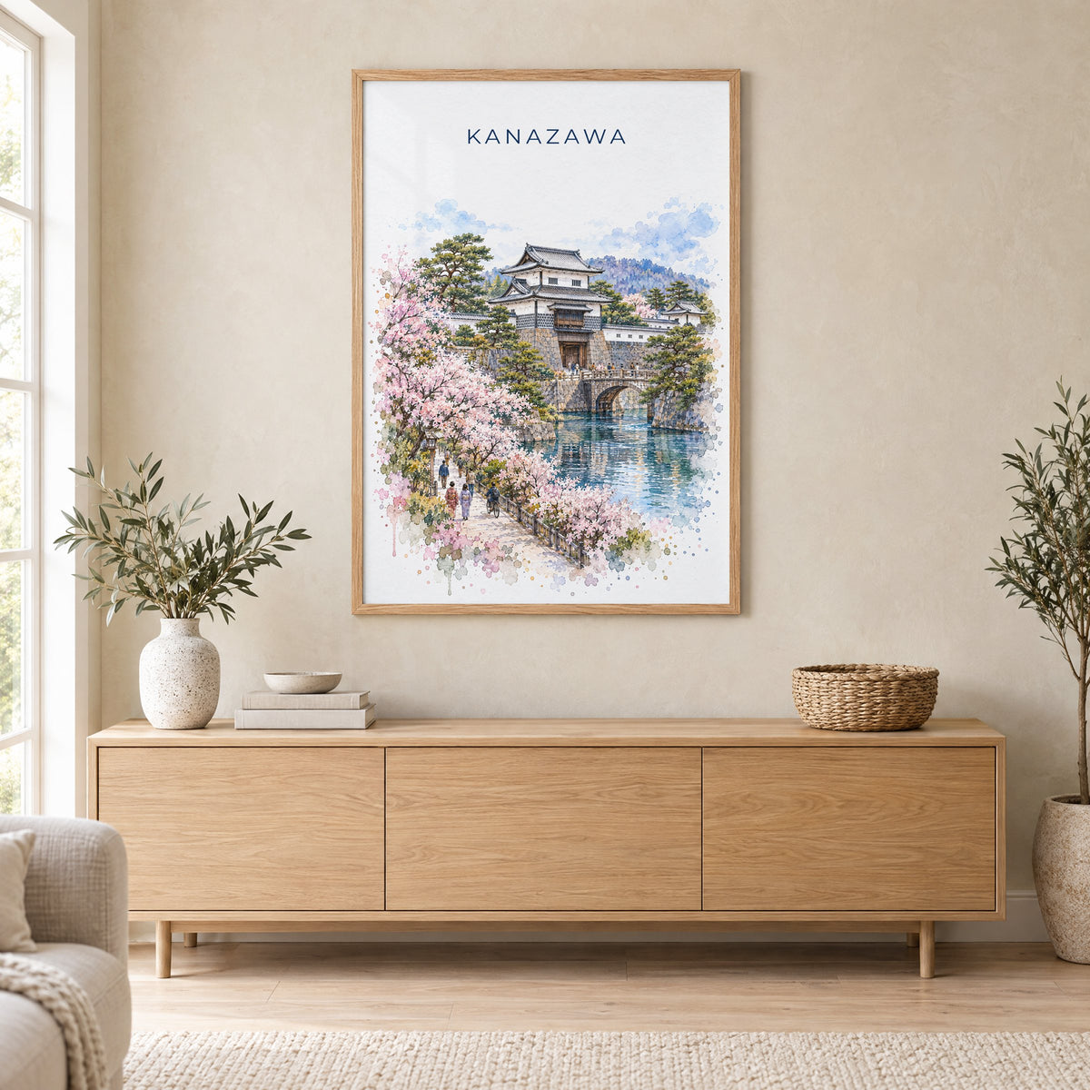 Kanazawa watercolor print in an oak frame above a light wood sideboard in a Scandinavian living room