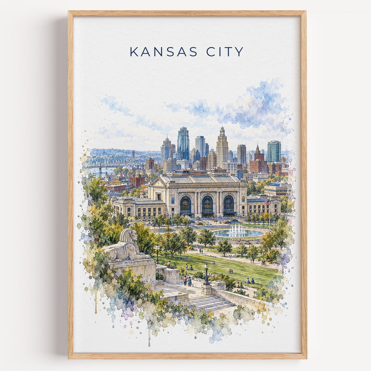 Kansas City watercolor print in a light oak frame on a plain white wall