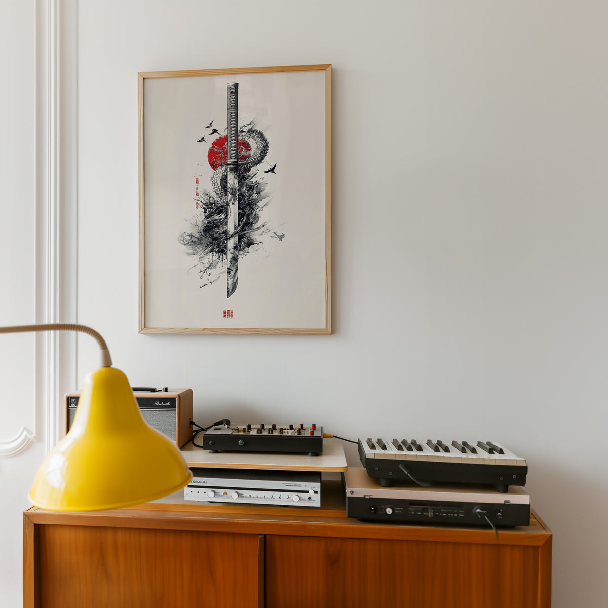 Ink dragon coiled around katana print in an oak frame above a teak sideboard with vintage hi-fi