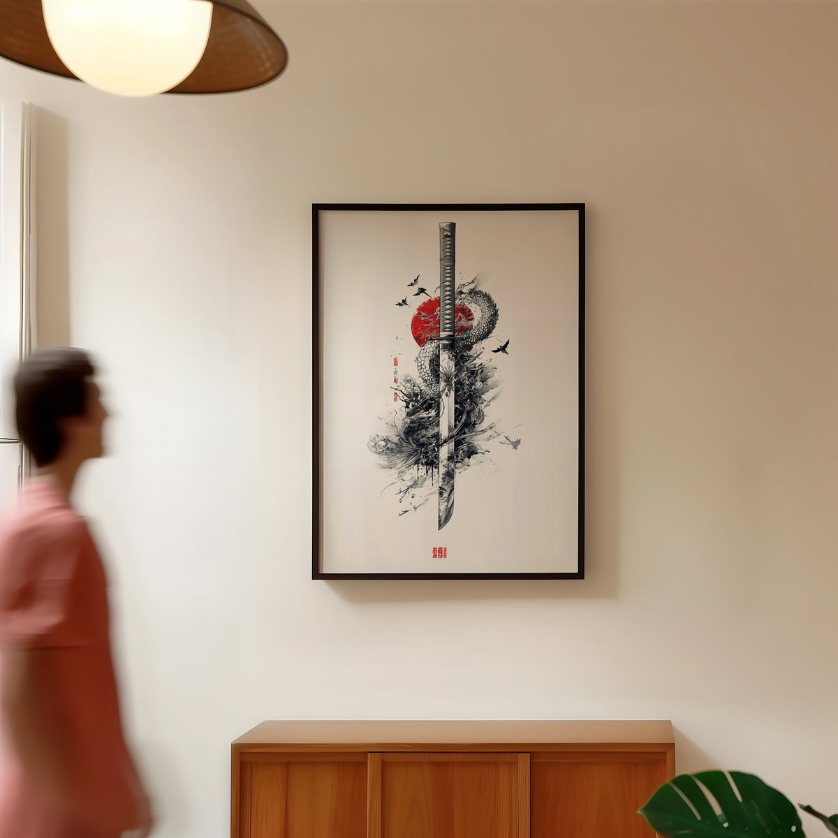 Ink dragon coiled around katana print in a black frame in a hallway under a rattan pendant
