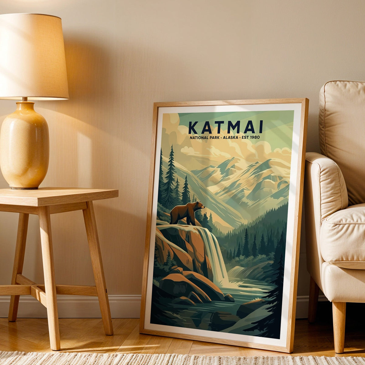 Katmai print in an oak frame beside a cream armchair and an amber lamp in warm afternoon light