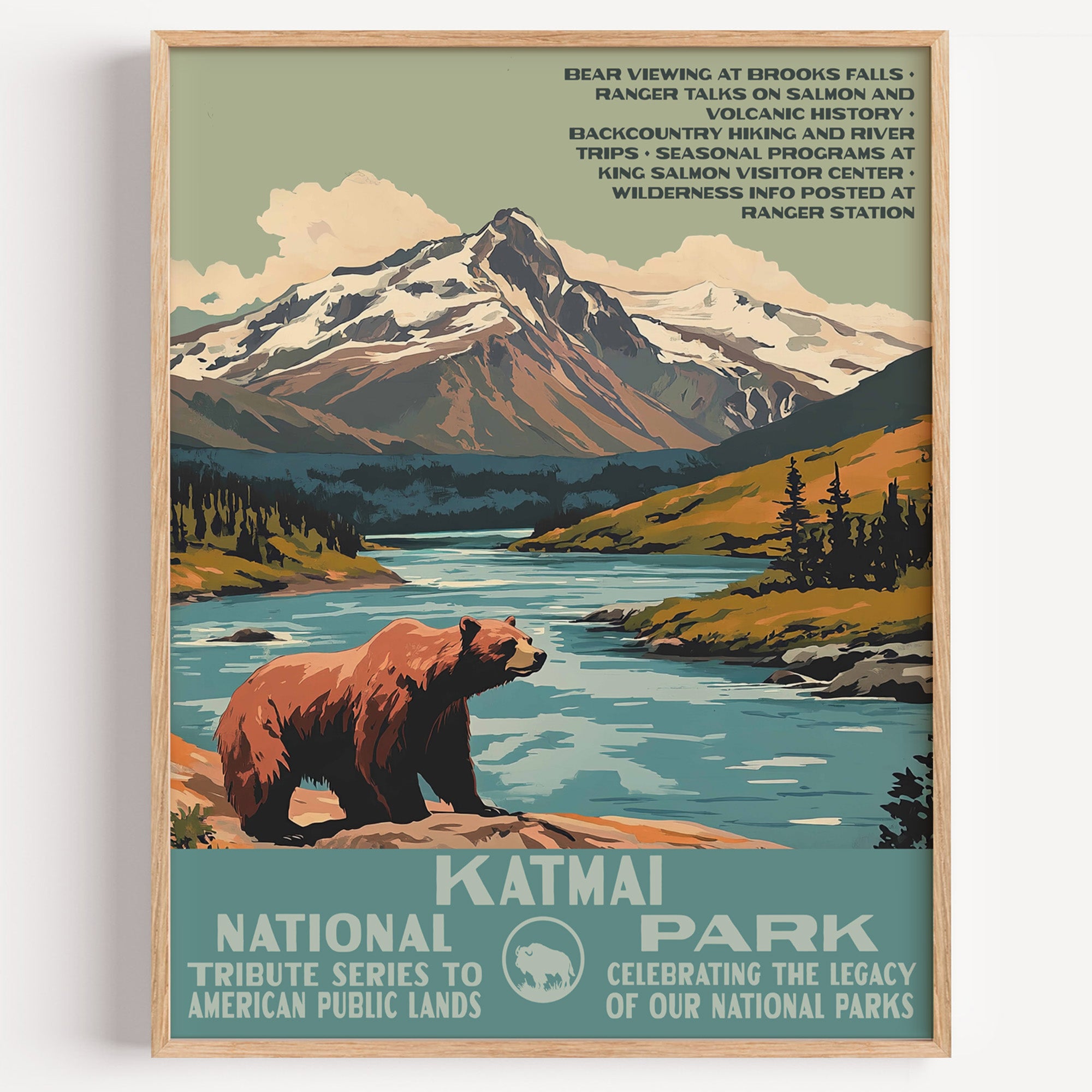 Katmai National Park wall art print in a thin wood frame, a brown bear on the riverbank below a snow-capped volcano