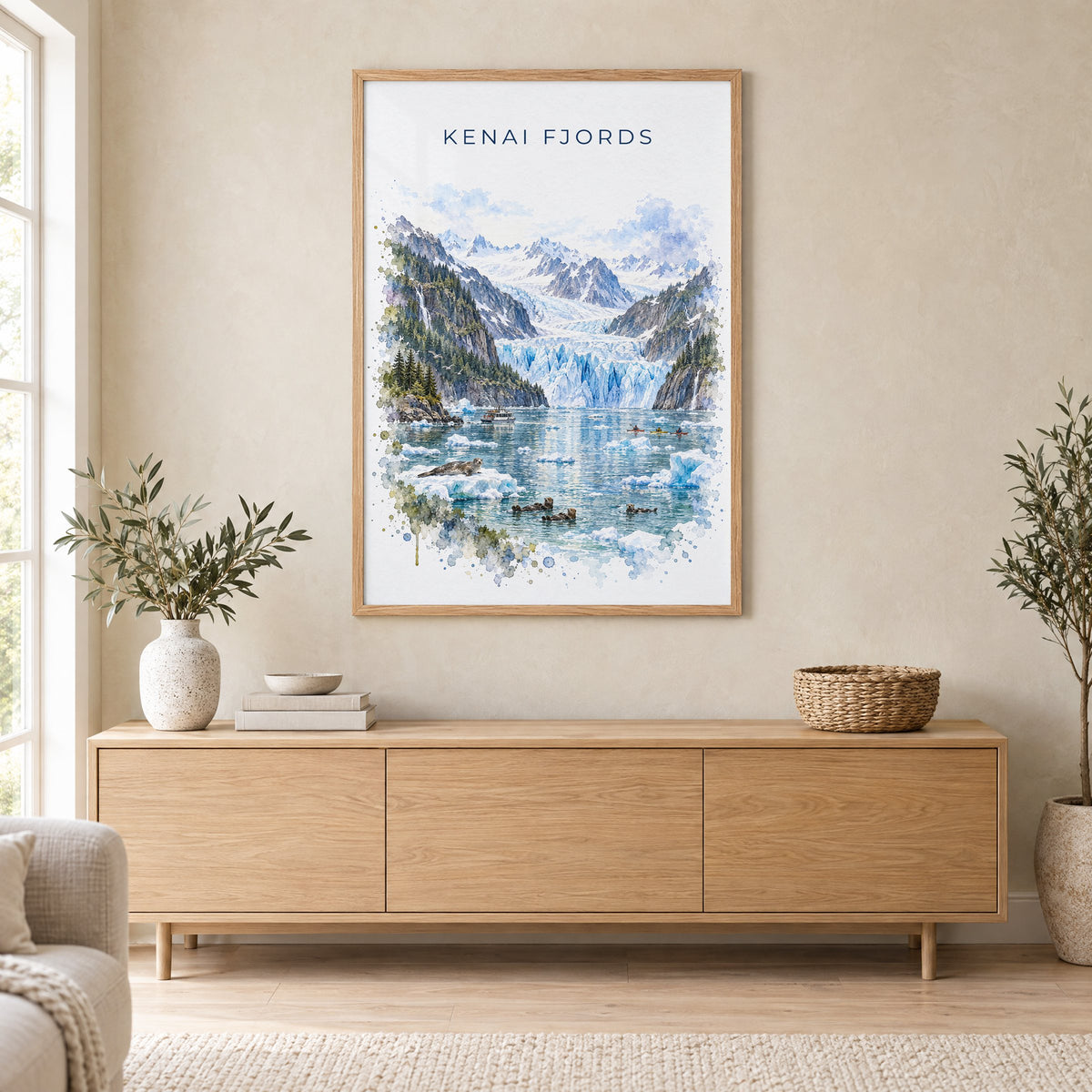 Kenai Fjords National Park watercolor print in an oak frame above a light wood sideboard in a Scandinavian living room