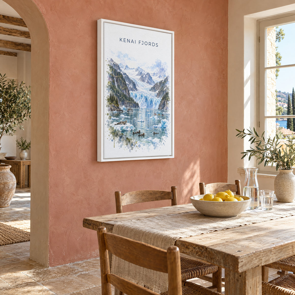 Kenai Fjords National Park watercolor print as a white floater canvas on a terracotta wall above a rustic dining table
