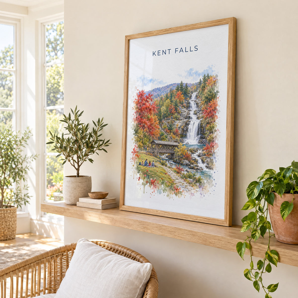 Kent Falls State Park watercolor print in an oak frame on a picture ledge in a sunlit sunroom