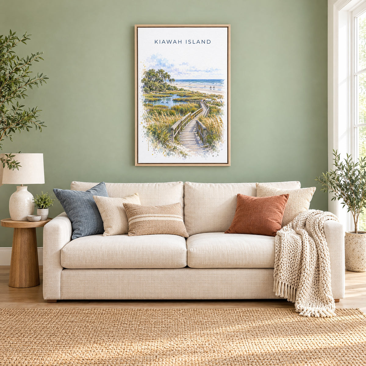 Kiawah Island watercolor print as a natural floater canvas above a cream linen sofa on a sage green wall