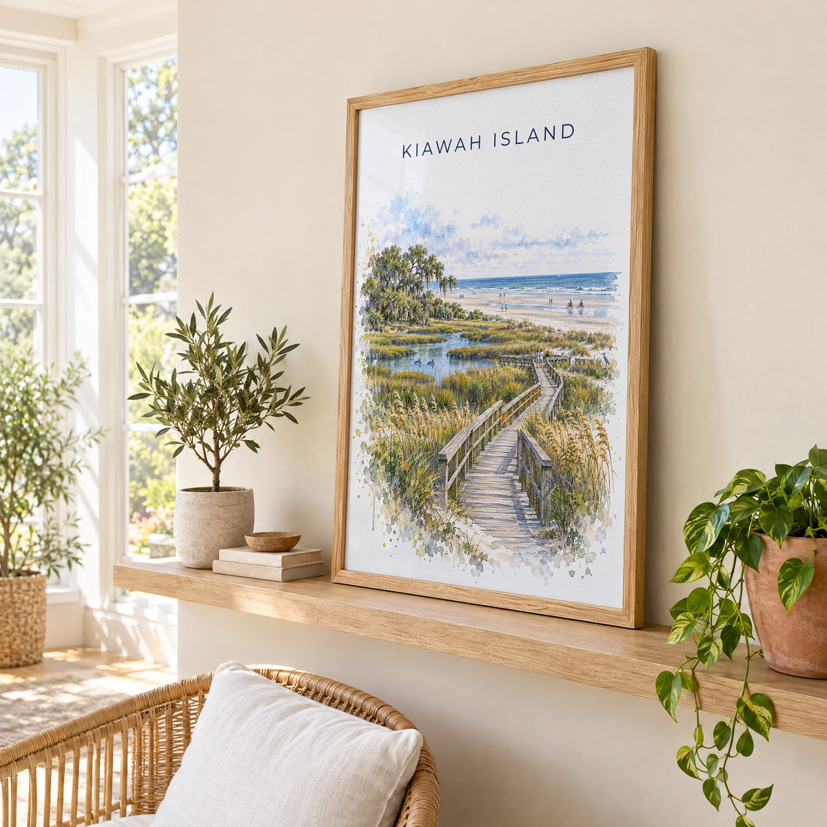 Kiawah Island watercolor print in an oak frame on a picture ledge in a sunlit sunroom