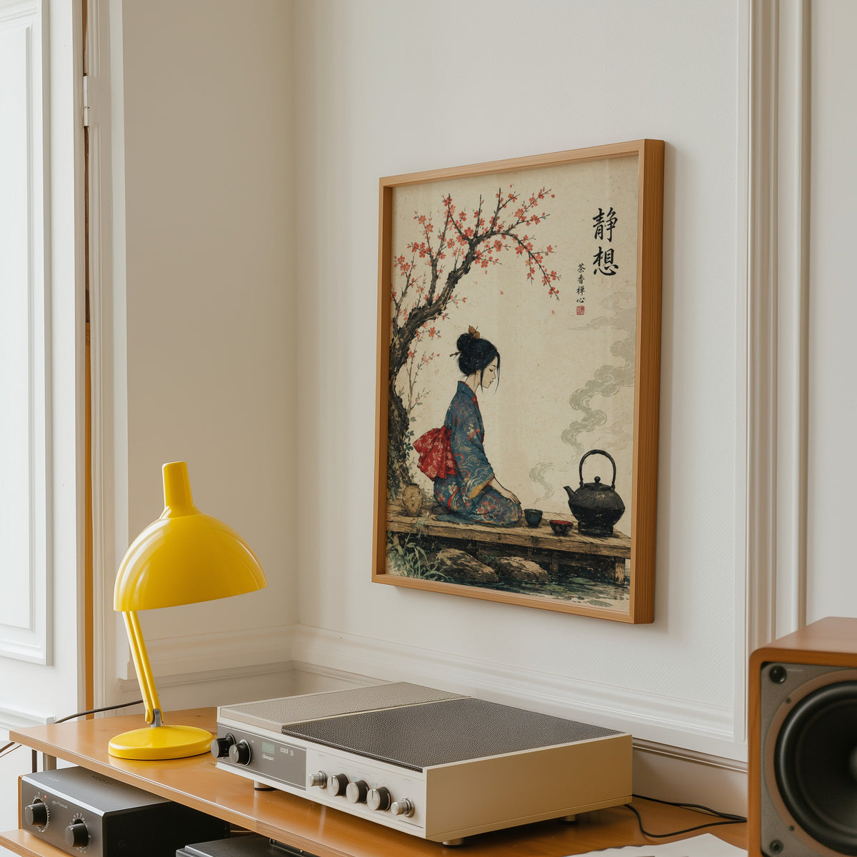 kimono woman with iron tea kettle print in an oak frame above a vintage hi-fi shelf with a yellow desk lamp