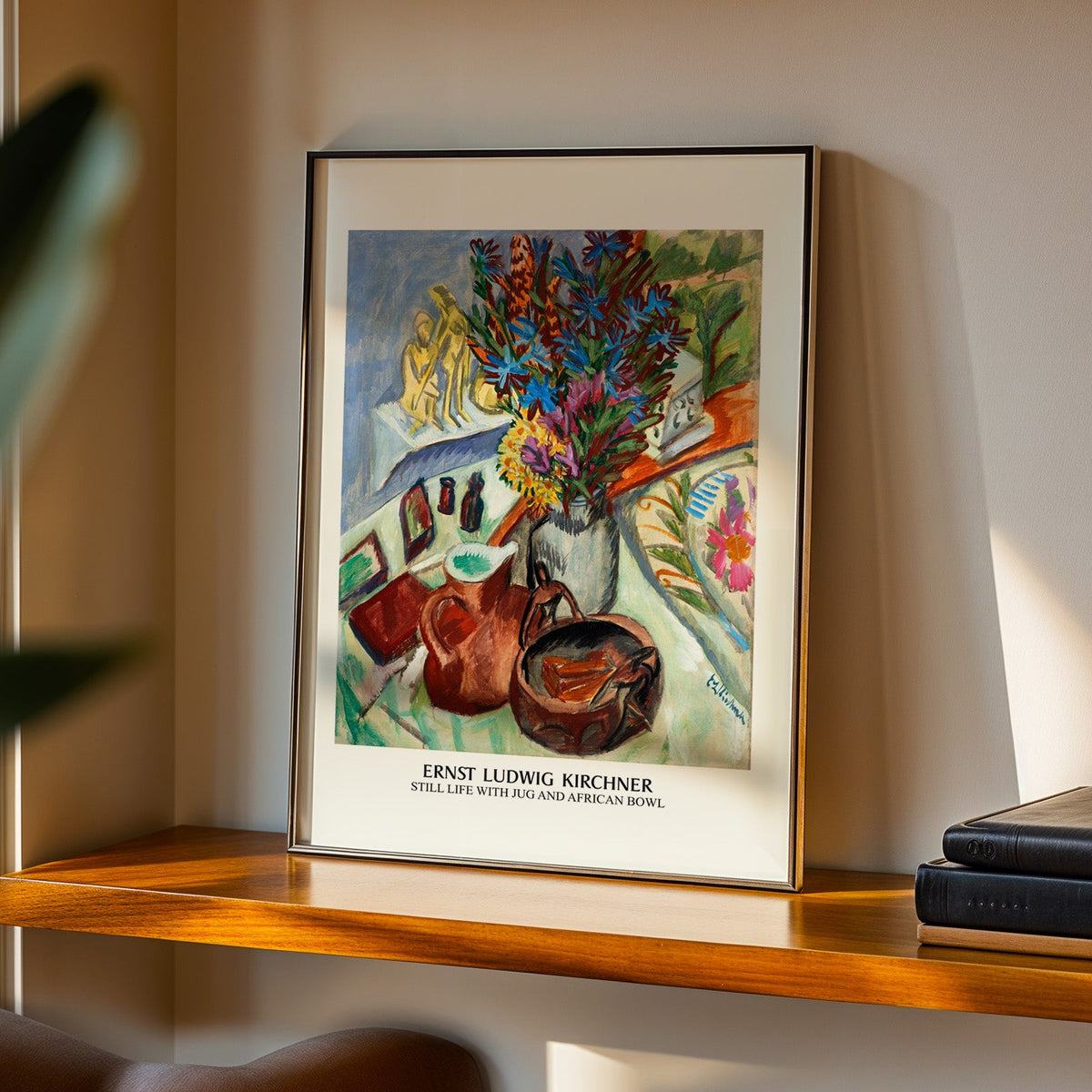 Still Life with Jug print in a black frame on a walnut shelf in evening light