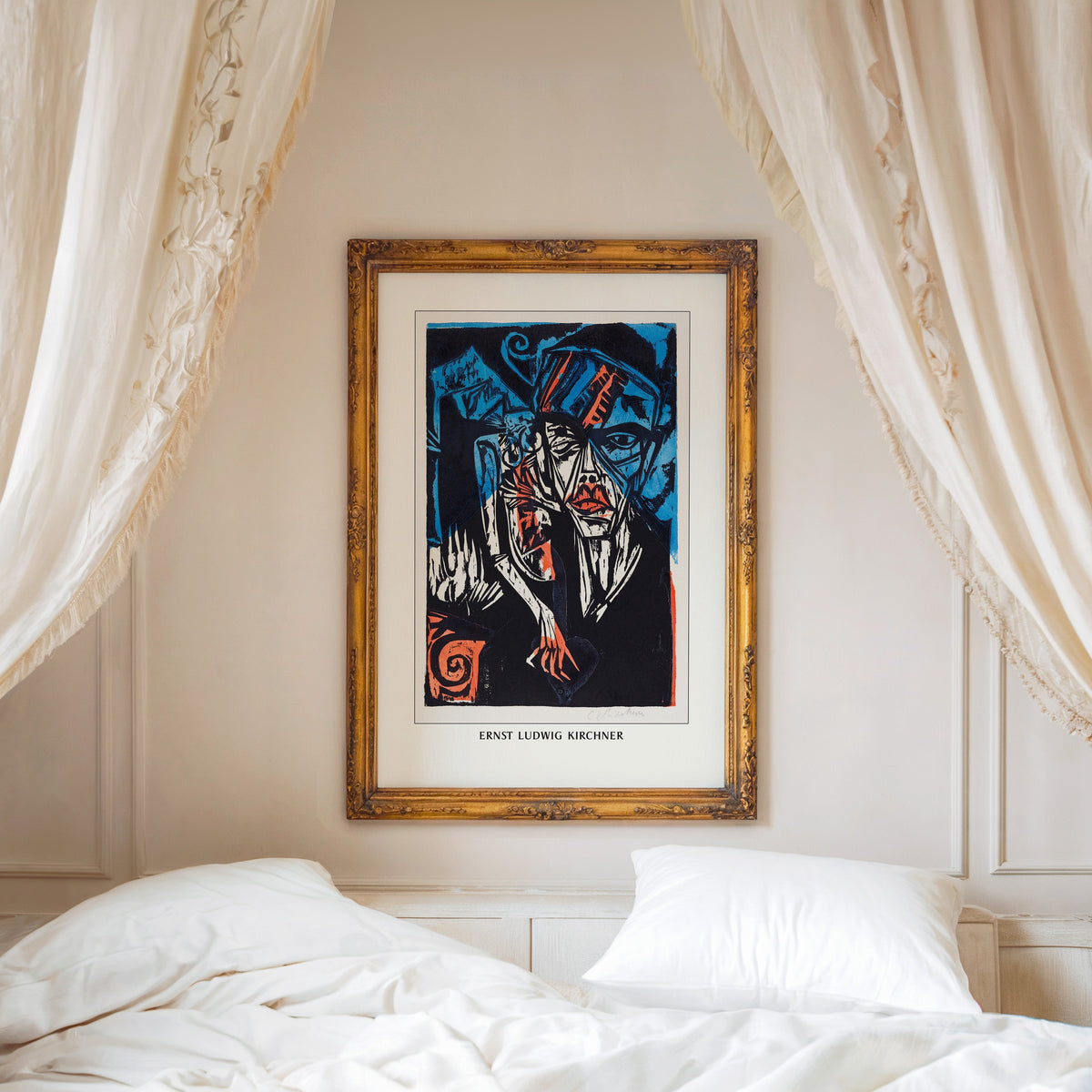 Kirchner woodcut head print shown in a gold frame above a canopy bed