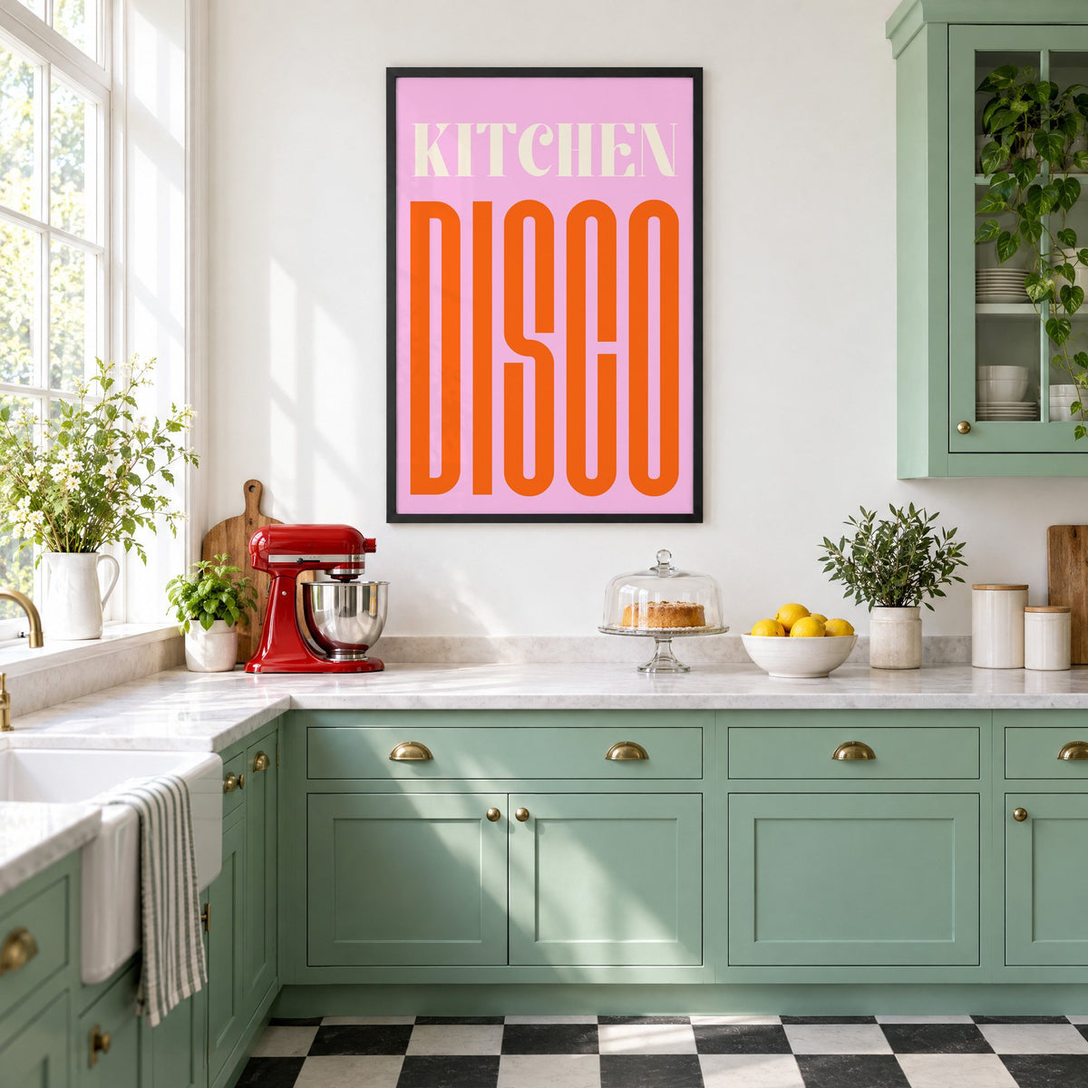 Kitchen Disco pink and orange type print in a black frame in a mint green retro kitchen above a red stand mixer