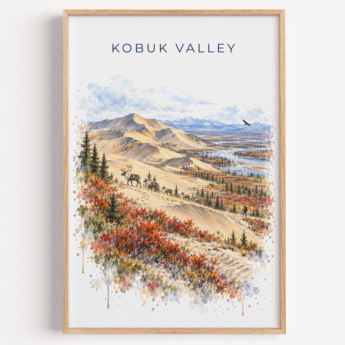 Kobuk Valley National Park watercolor print in a light oak frame on a plain white wall
