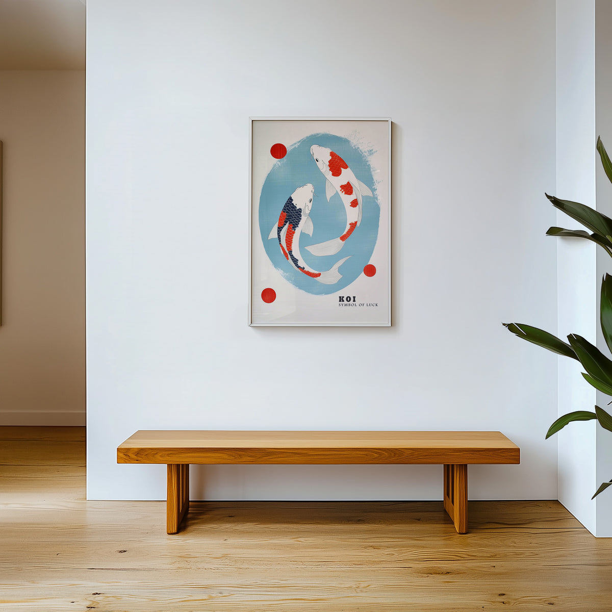 Two koi circling in blue oval print shown in a white frame above a wooden entryway bench