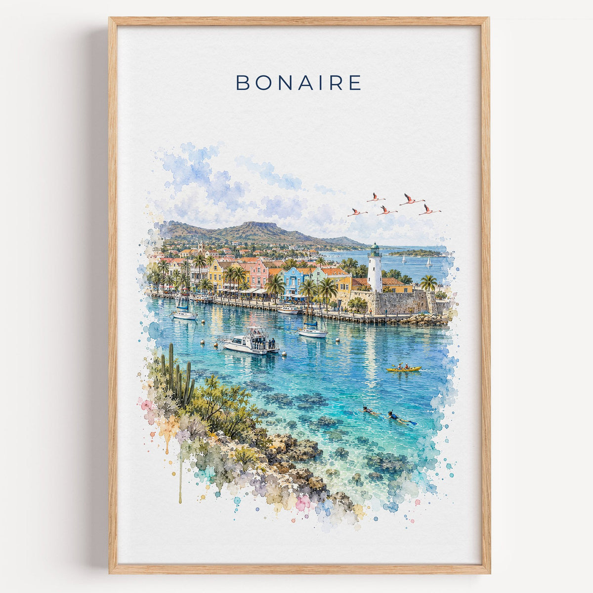 Bonaire watercolor print in a light oak frame on a plain white wall