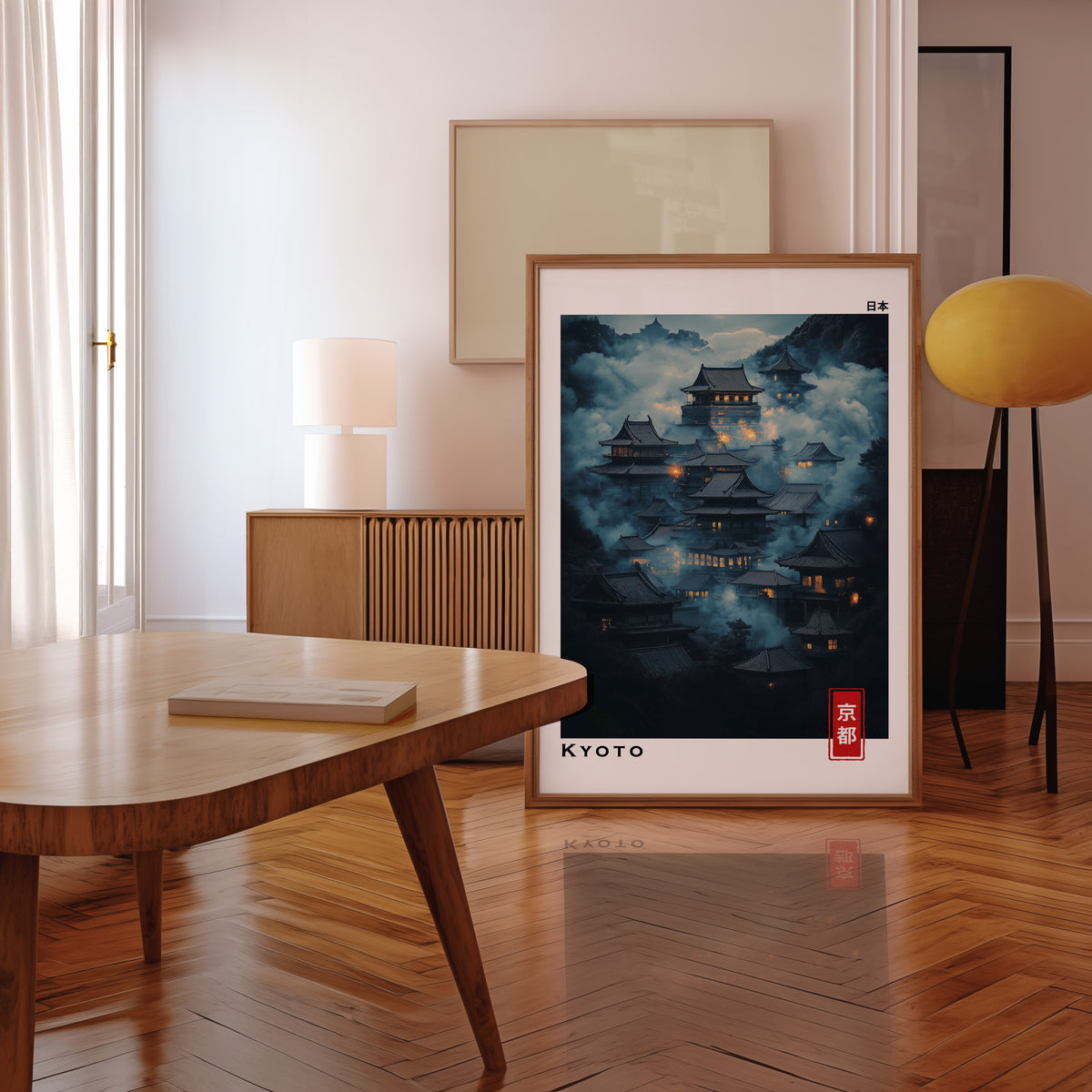 Kyoto misty night temples print in a walnut frame leaning in a mid-century living room