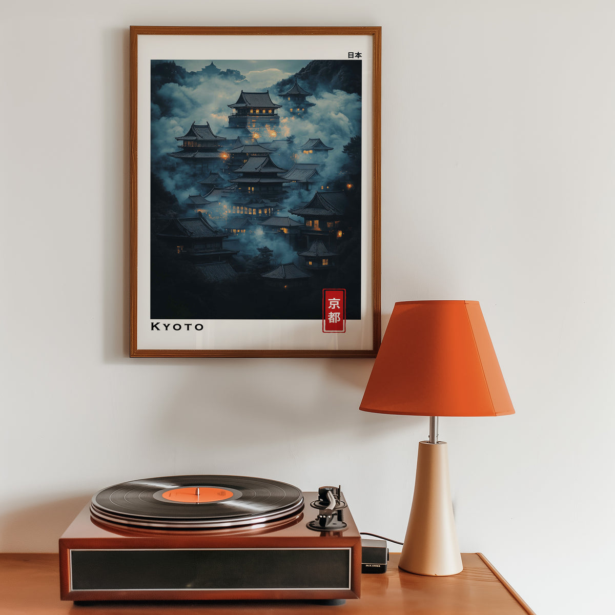 Kyoto misty night temples print in a walnut frame above a sideboard with a record player
